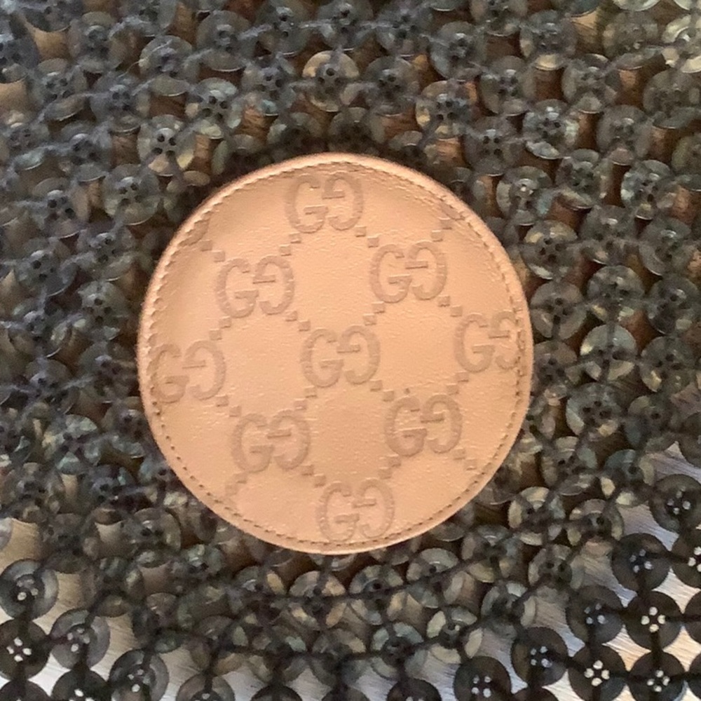 Gucci compact mirror with leather sleeve